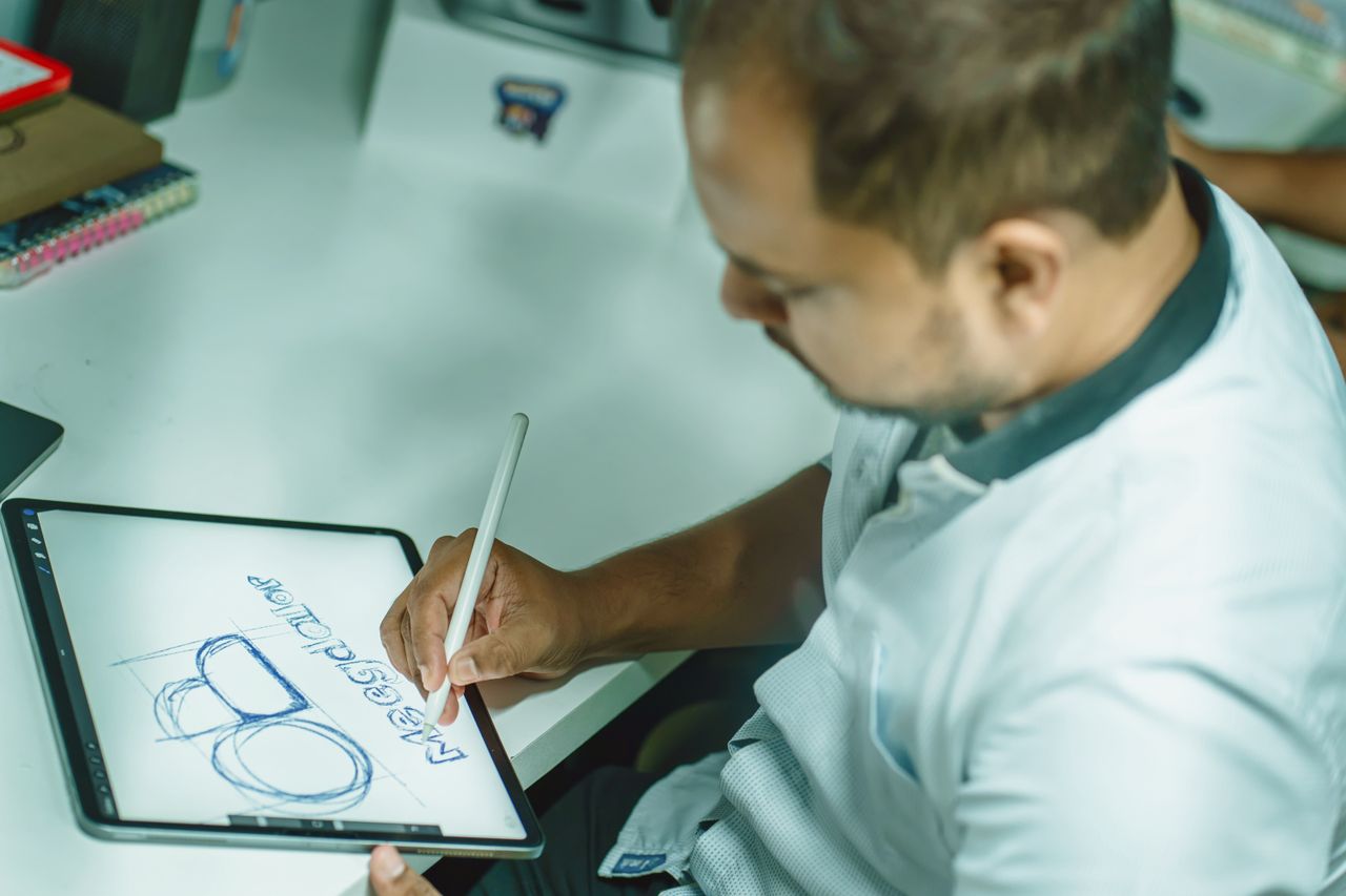 Graphic designer drawing on a digital tablet