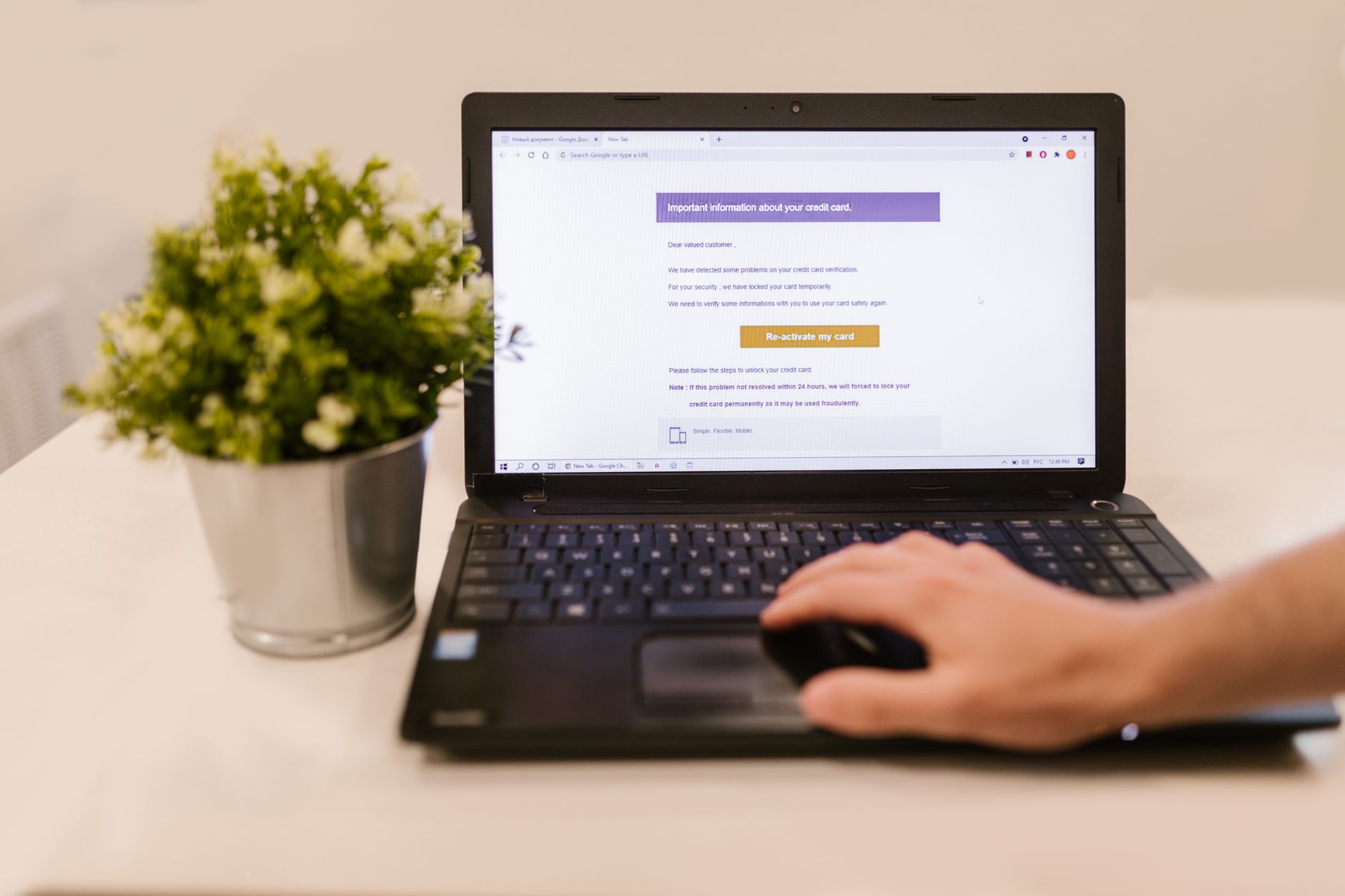 Person reading an email on a laptop